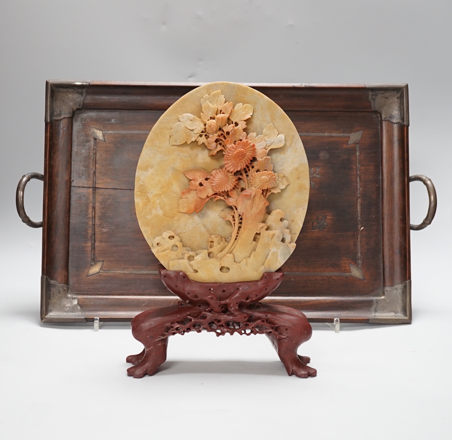 A Chinese white metal mounted hongmu tray and a Chinese carved soapstone table screen on stand, tray 44cm x 29.5cm